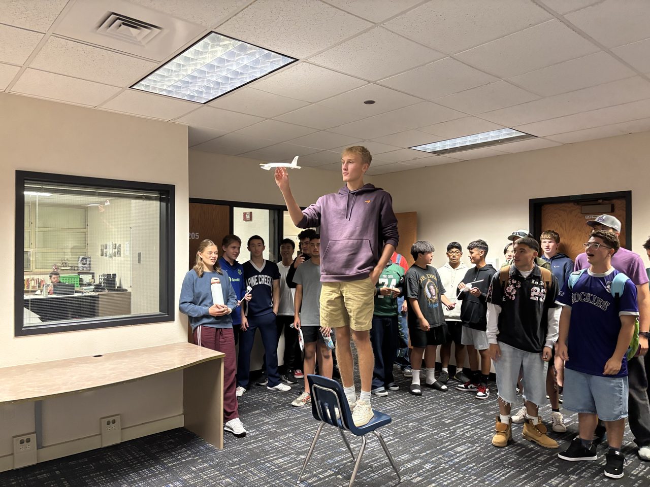 A student launches his glider at the ABLE Engineering Aerodynamics & Glider Workshop